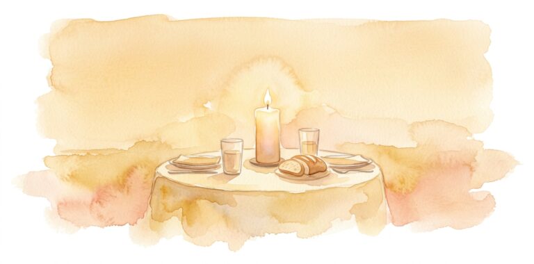 Small round table in a dream set for two with a tall lit candle, two glasses and simple bread
